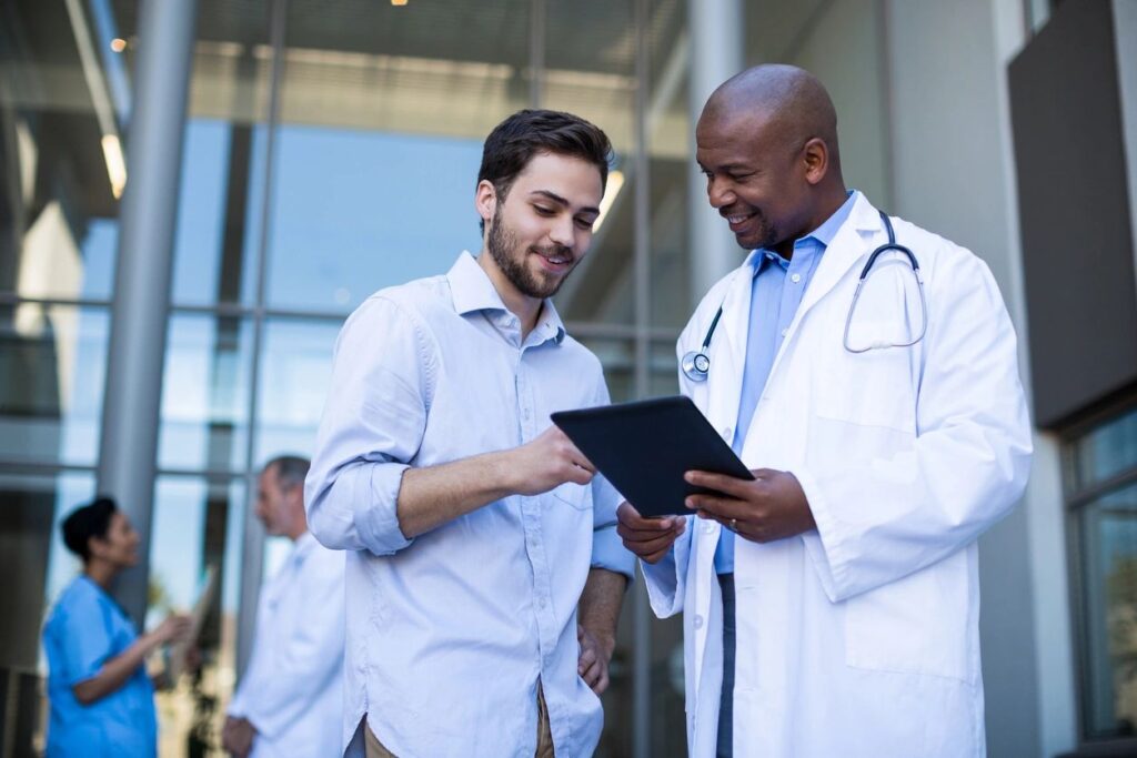 Oncologists reviewing a patient chart